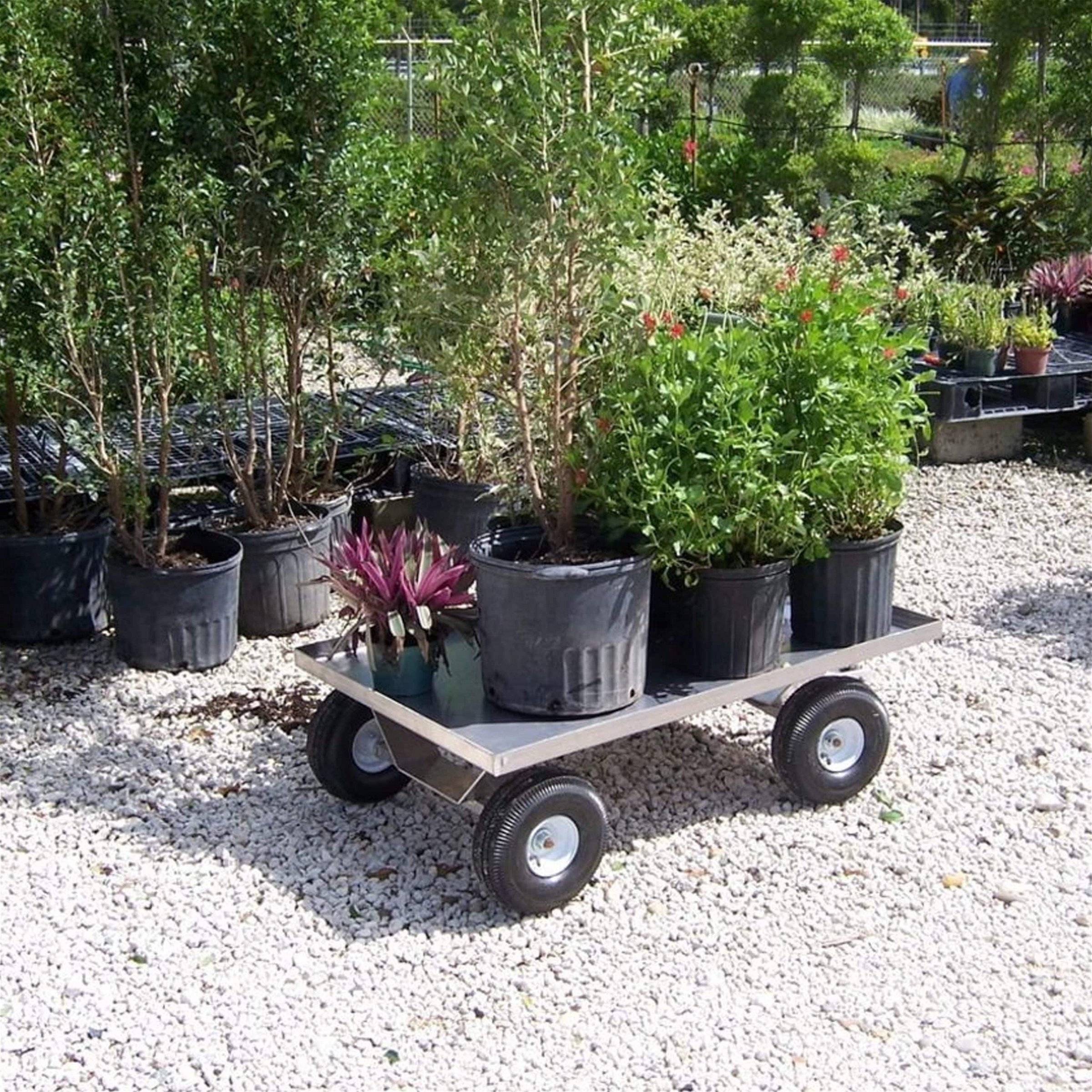 All Aluminum Pull Wagon from Kahuna Wagons loaded full of potted plants.