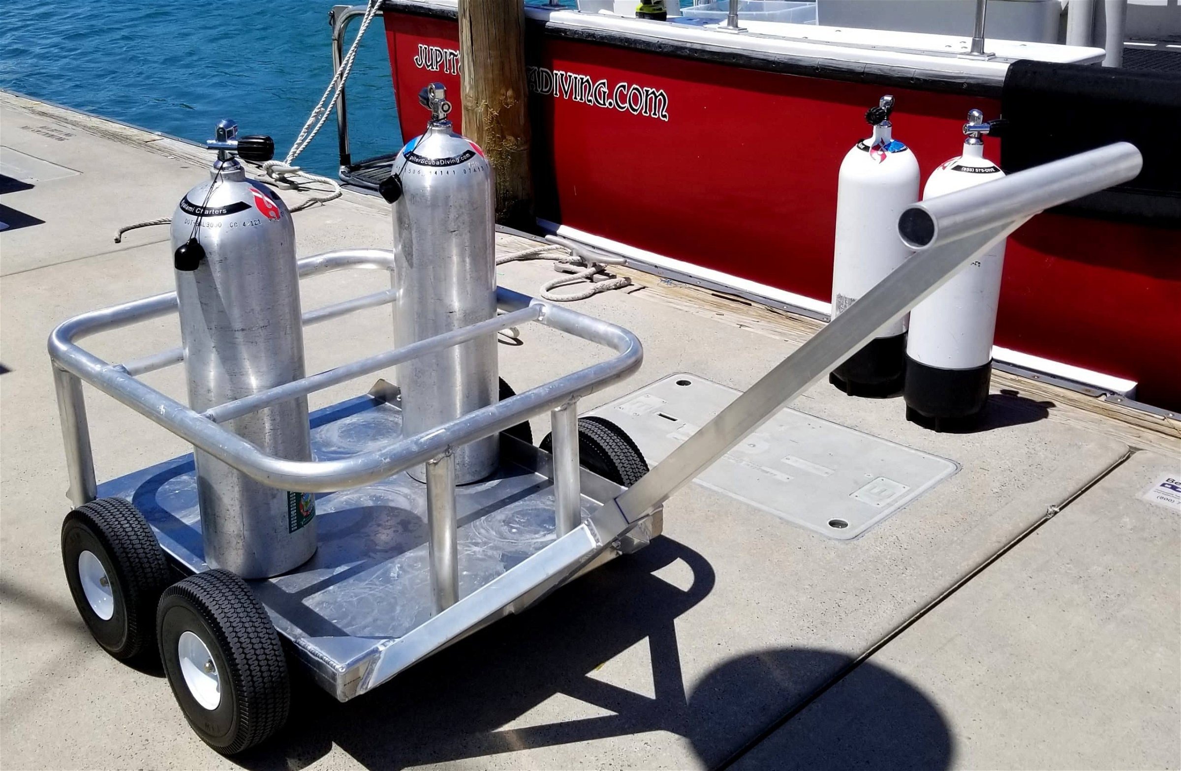 Two oxygen tanks sitting in the all aluminum Scuba Niner, on the pier from Kahuna Wagons.