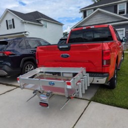 Suburban Driveway with Red F-150 and Kahuna Rack