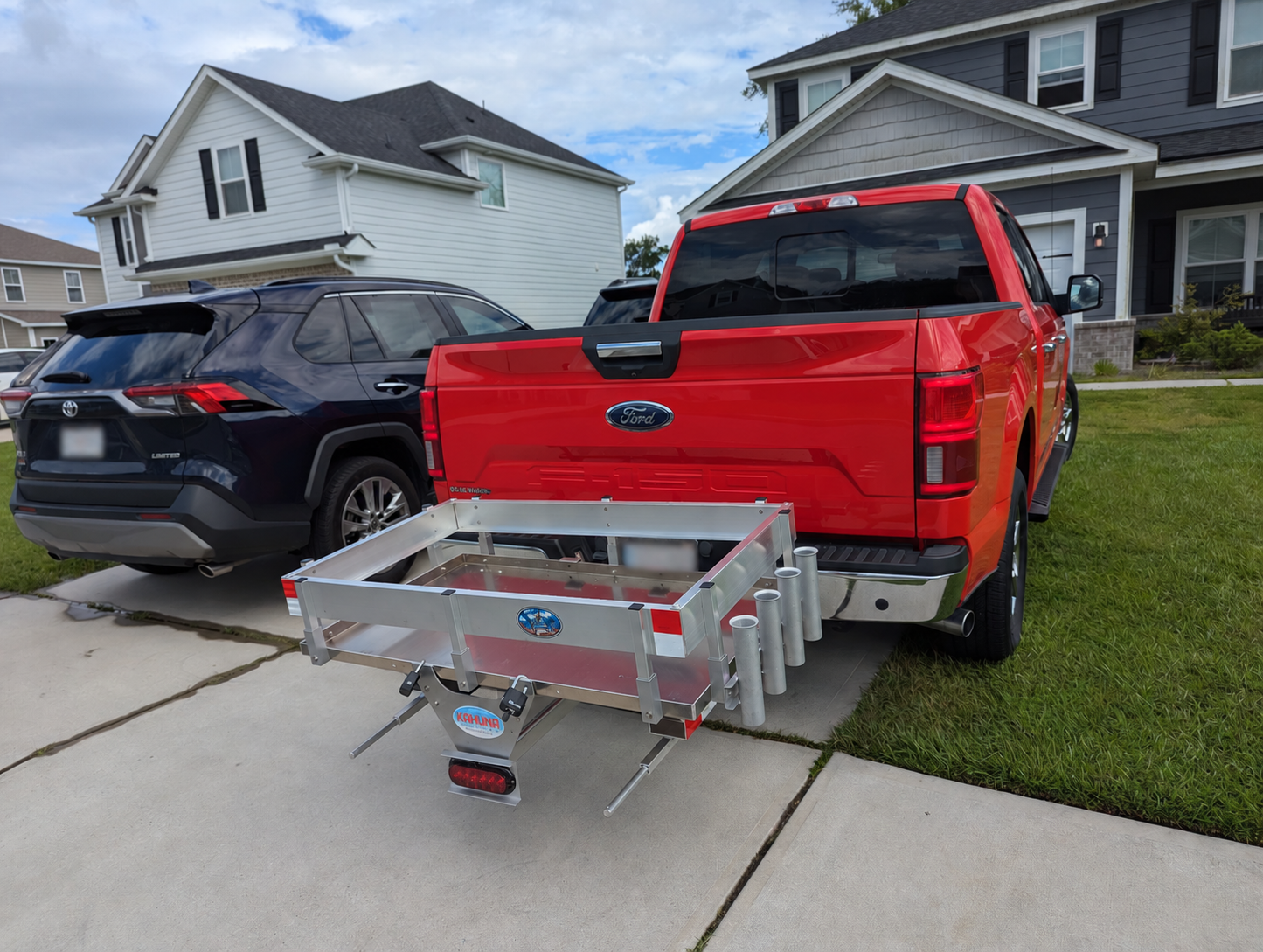 Suburban Driveway with Red F-150 and Kahuna Rack