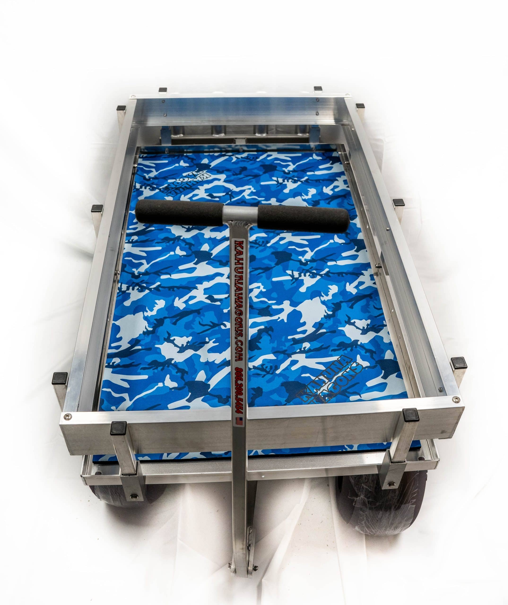 A blue camo 8mm neoprene padded deck mat inside of a Kahuna Wagon.