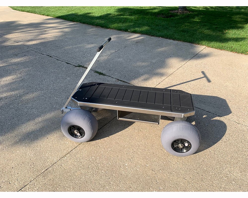 Efoil-buggy sitting on a sidewalk