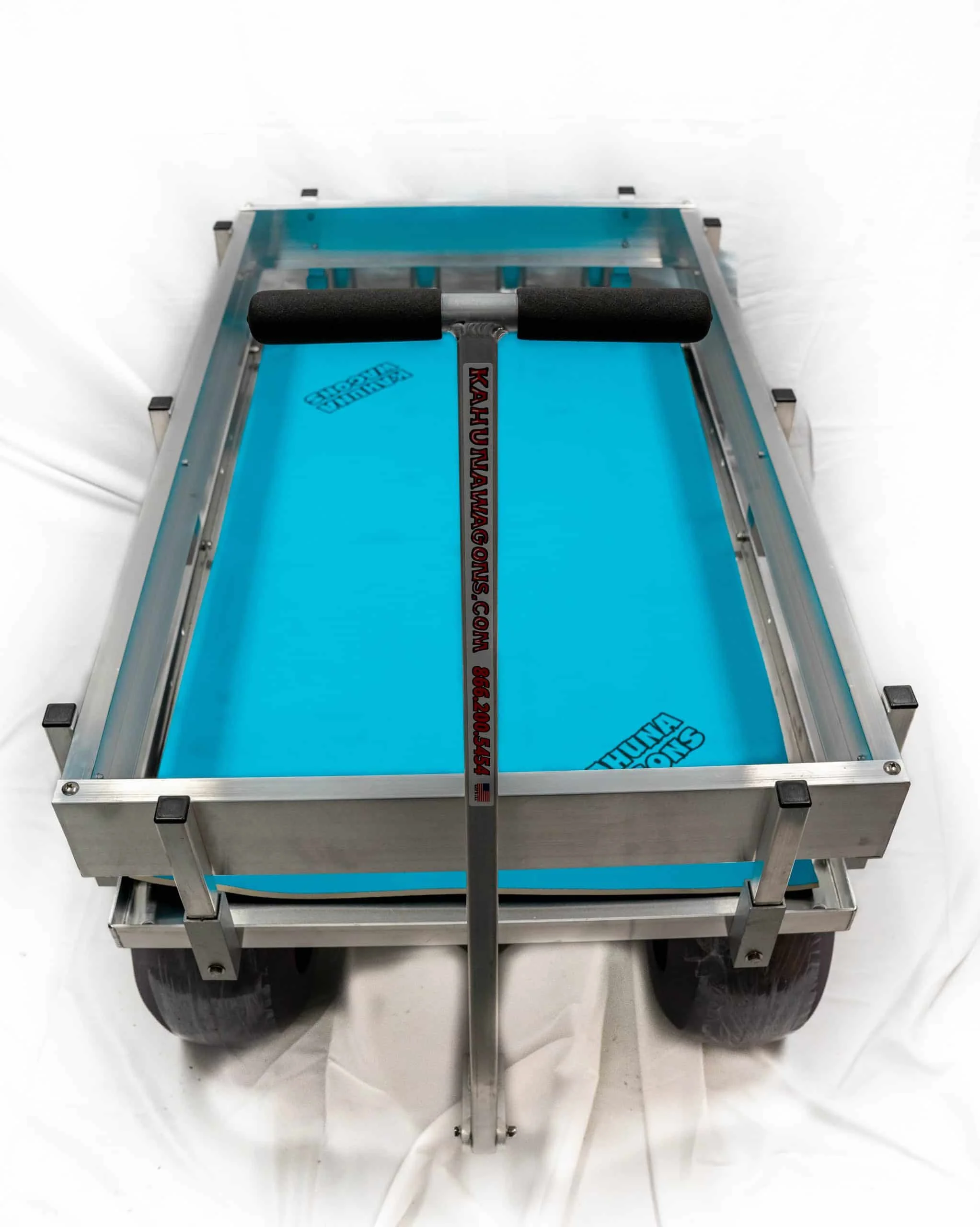 teal blue neoprene deck mat inside aluminum wagon
